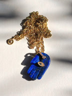 collier pendentif main