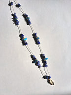 Collier signature tanzanite main (long)