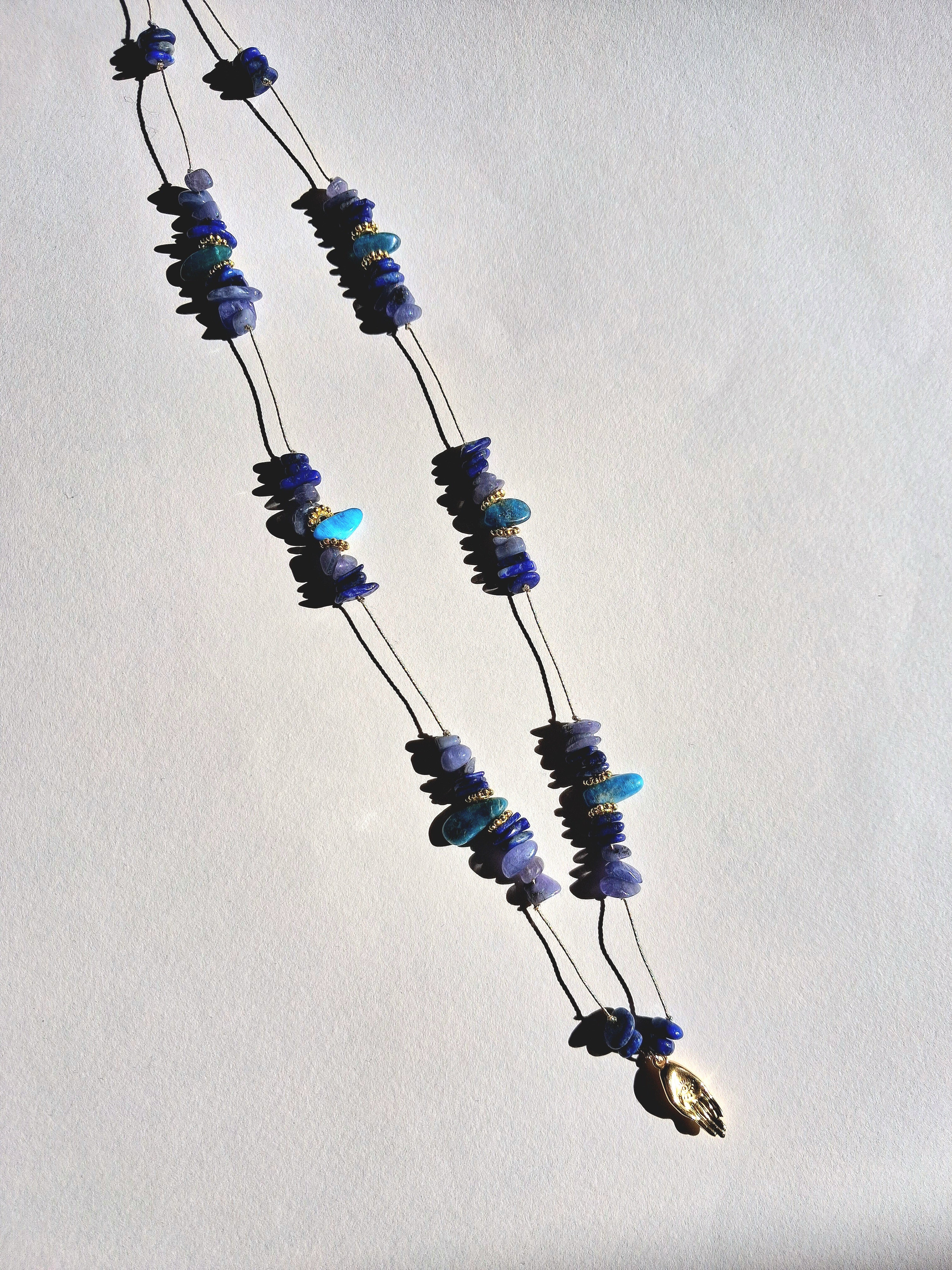 Collier signature tanzanite main (long)