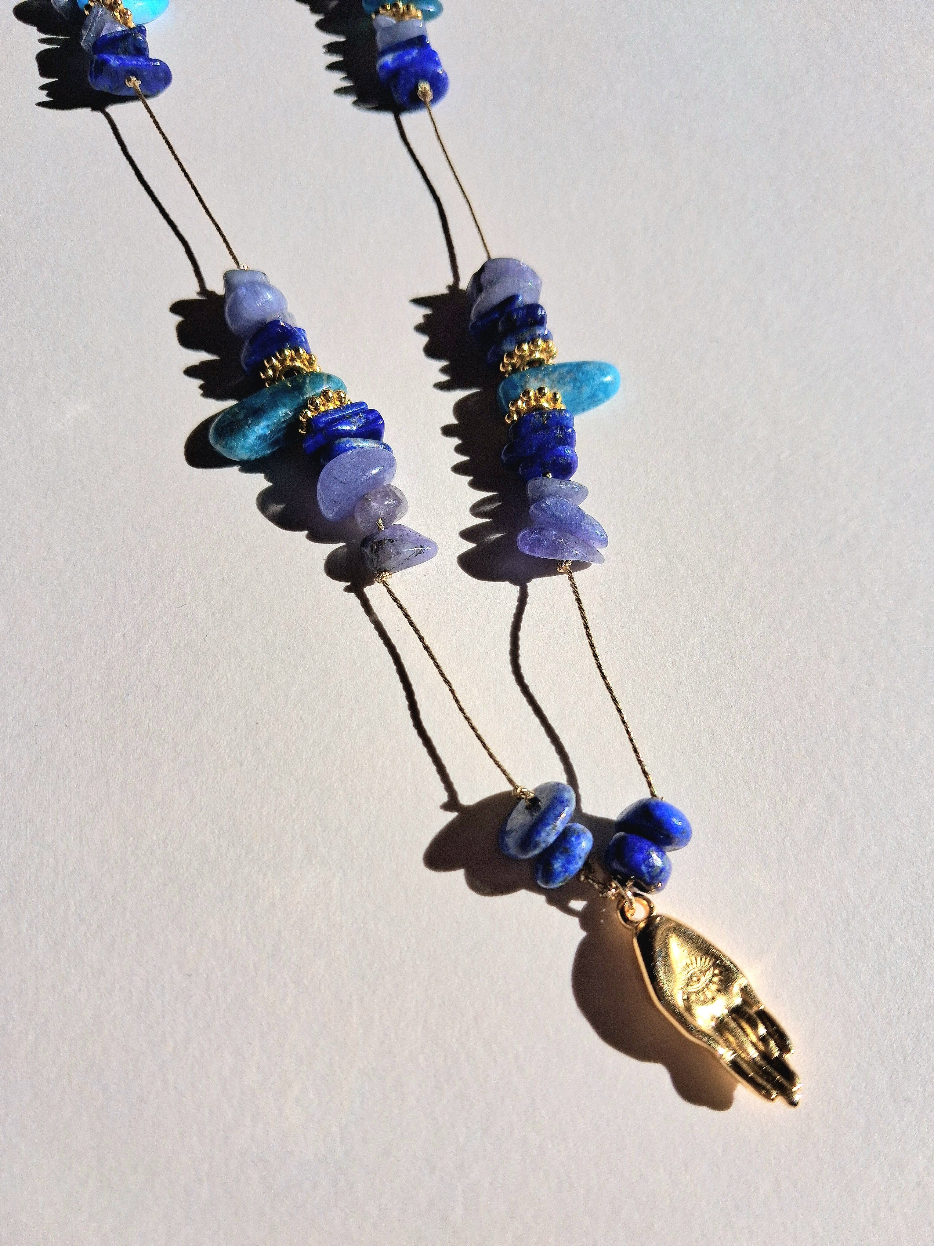 Collier signature tanzanite main (long)