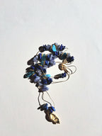 Collier signature tanzanite main (long)