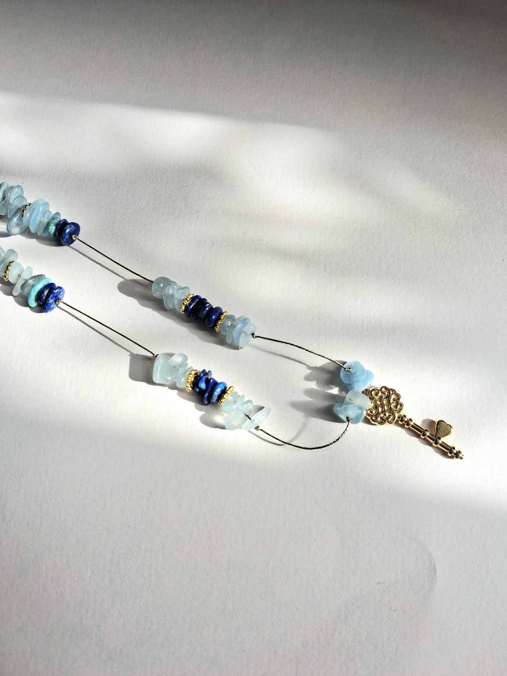 Collier signature aigue-marine clé (long)