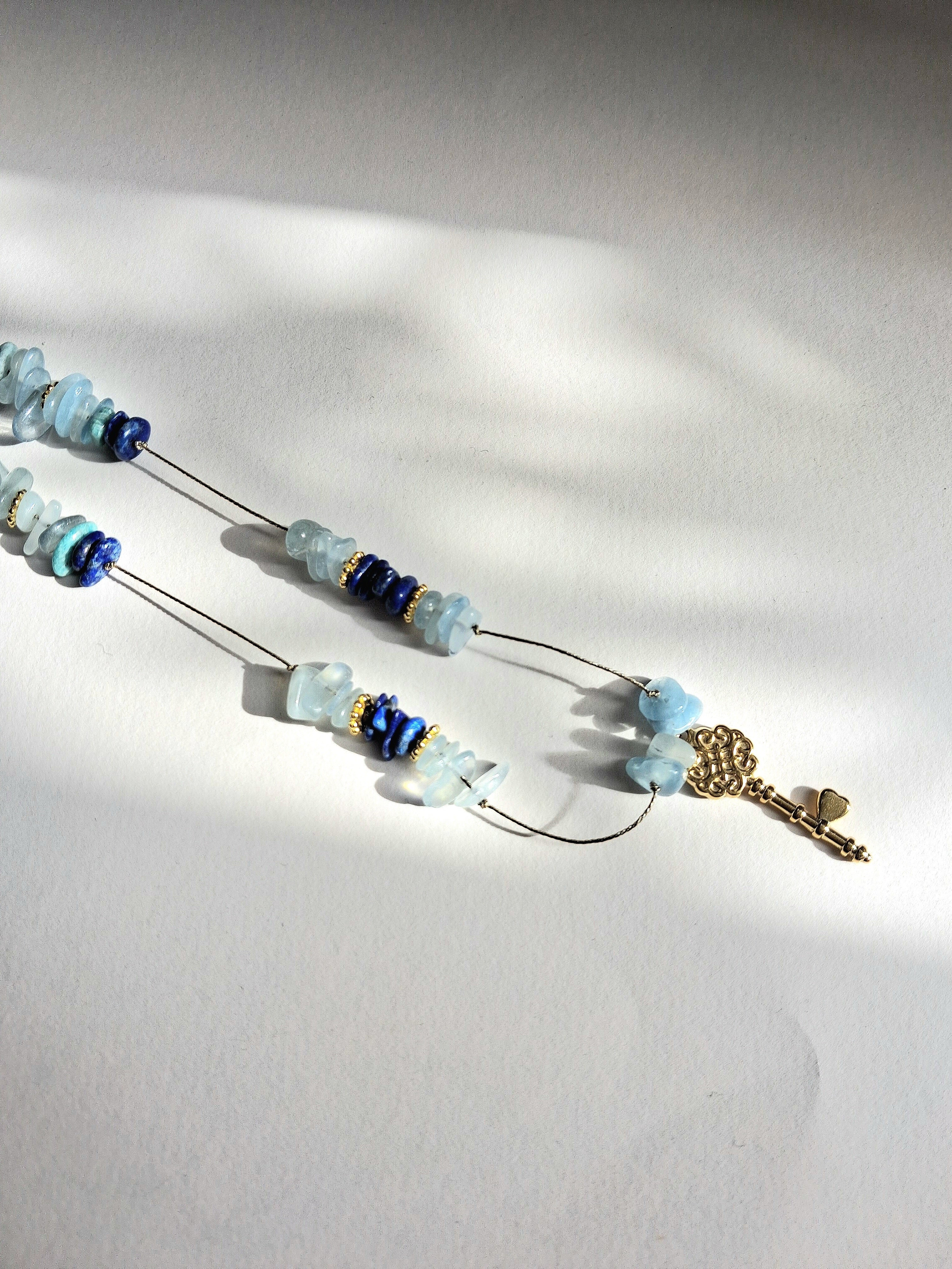 Collier signature aigue-marine clé (long)