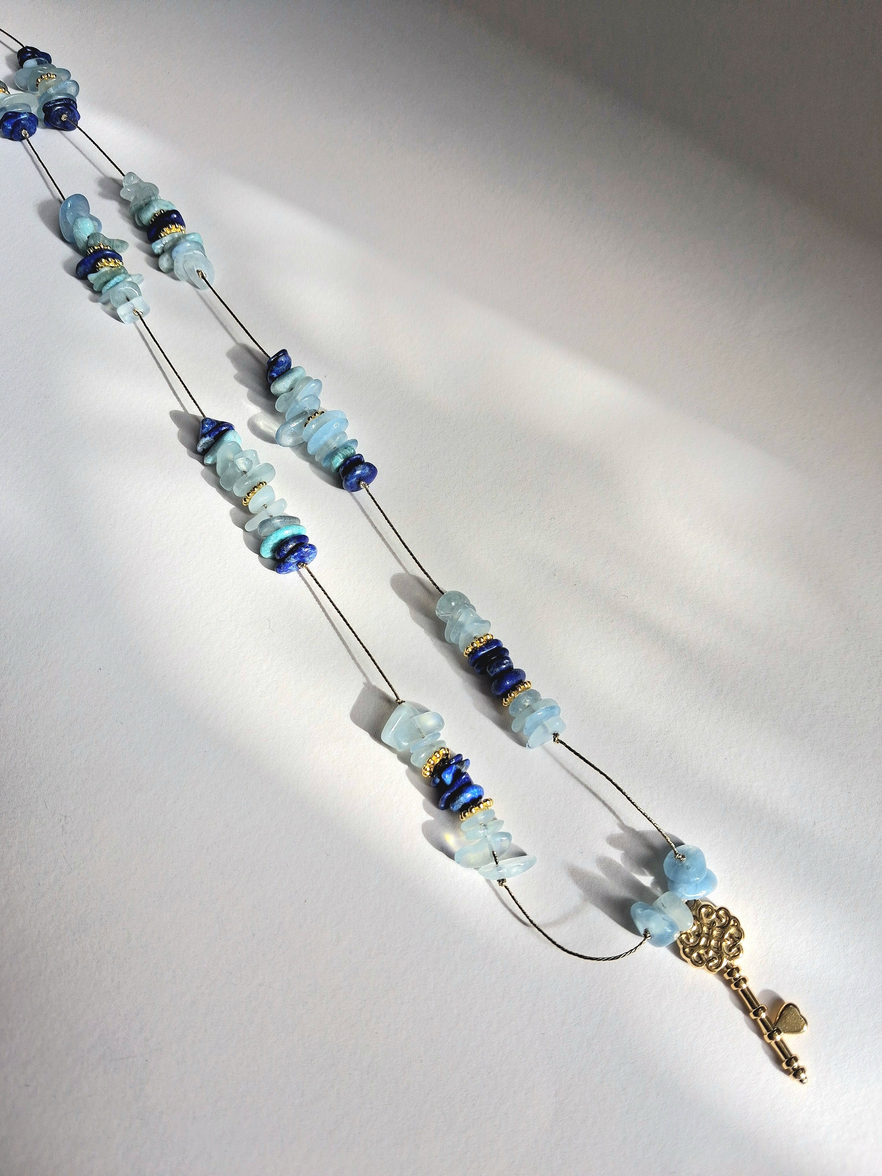 Collier signature aigue-marine clé (long)