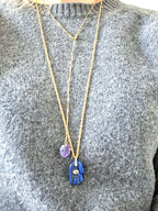 collier pendentif main