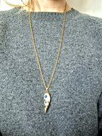 collier coquillage serti lapis lazuli